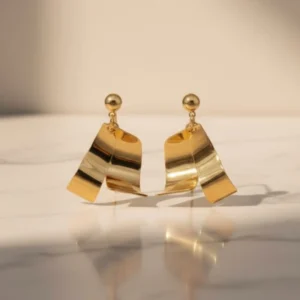 Gold Sculpted Ribbon Drop Earrings