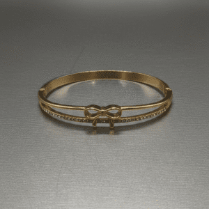 Chic Bow Accent Gold Bangle – Pavé Elegance, 18k Gold-Plated