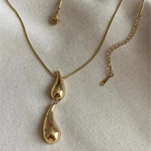 Golden Duo Drop Pendant Necklace – Sculptural Fluidity