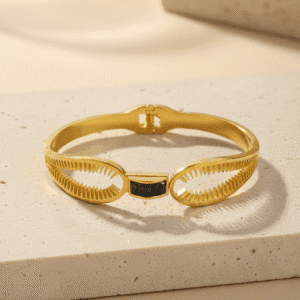 Golden Modernist Openwork Bangle – Black Accent Centerpiece